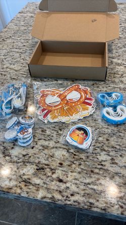 Beer, keychains, bracelets, pins stickers, and paper face mask