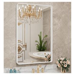 wastebasket, mirror, towel rack