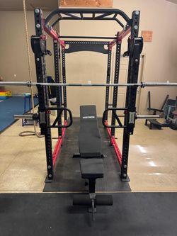 Squat rack, jammer arms, bench and bar