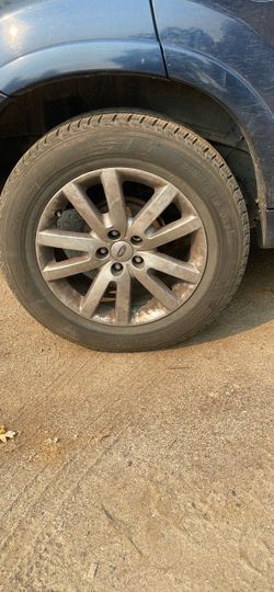 1 tire for $150 Ford OEM Alloy Wheel with Tire 245/60R18