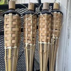 (12) Bamboo Torch Lights with Fluid . Each Retails $12.50 Tax. Sell Each $5 Or All For $50 