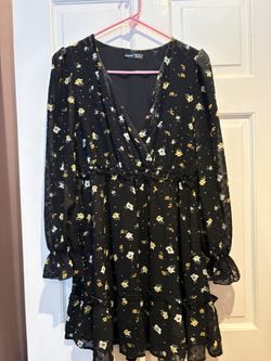 SHEIN black floral print smocked waist ruffle crepe mini dress. 