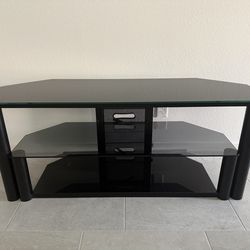 Black TV stand/Entertainment Center (metal and glass)