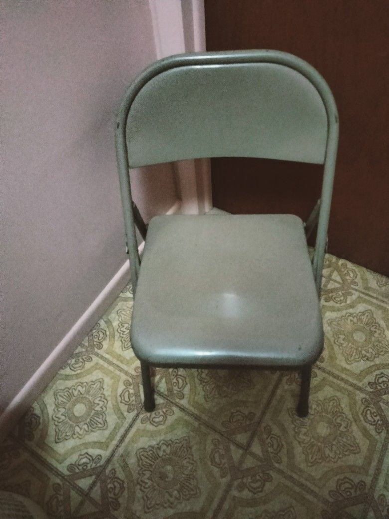 One Folding Metal Chair