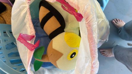 Around 15 Pokémon plushies