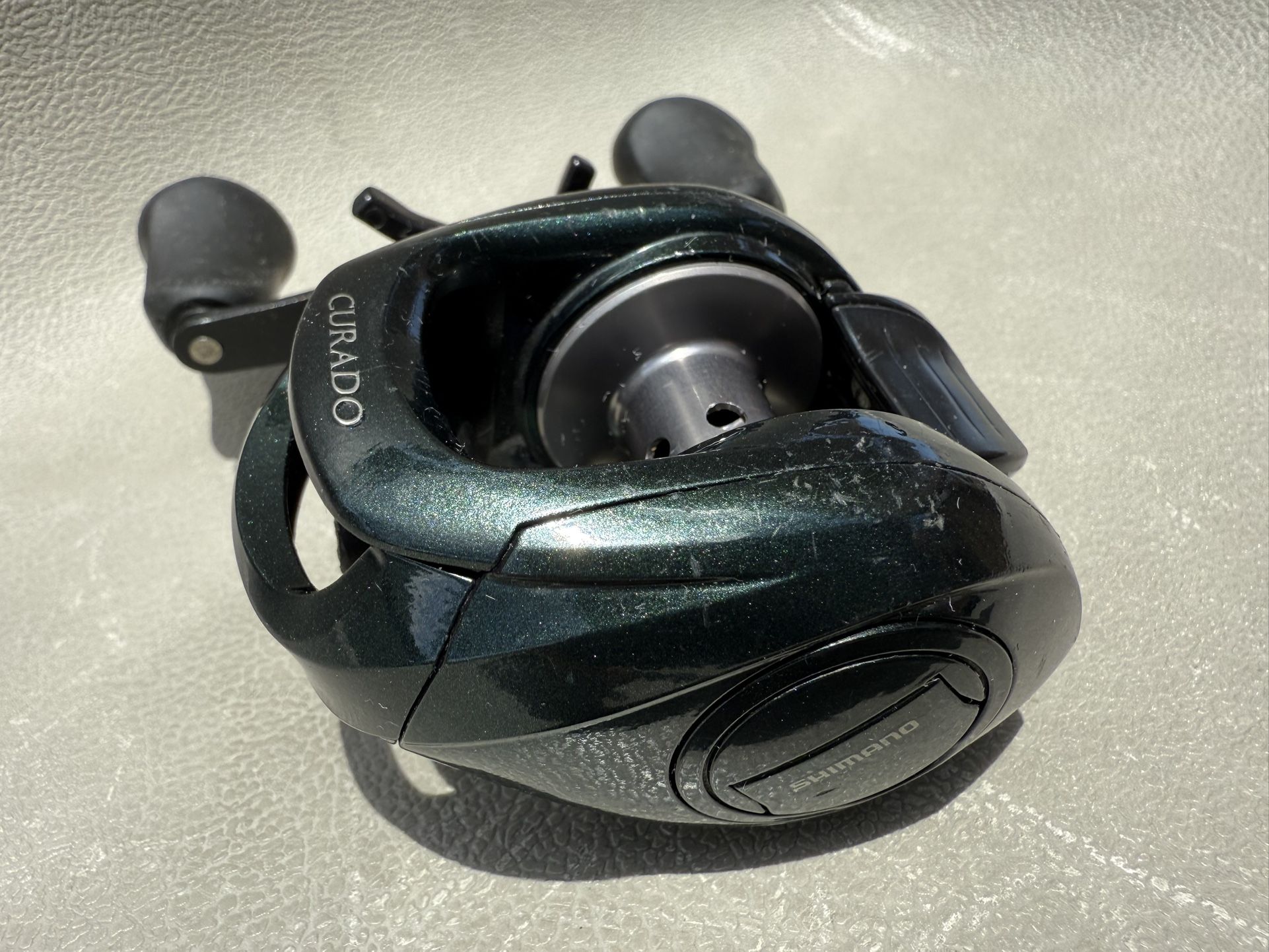 green shimano curado CU200XGM 200 M Baitcasting Reel The Curado series of rods now feature Shimano CI4+ reel seats for increased sensitivity and reduced weight Shimano Curado Casting Rod