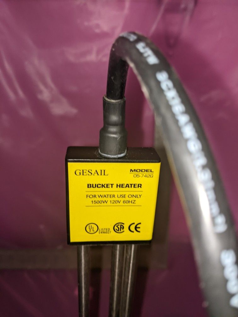 Immersion heater - bucket heater .