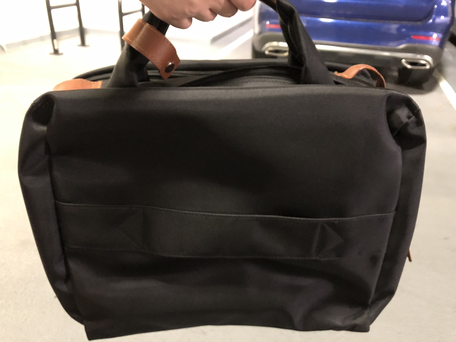 Black laptop bag (good for travel and commute)