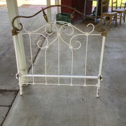 Antique headboard …located In Gustine