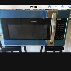 NEW IN THE BOX MICROWAVE 