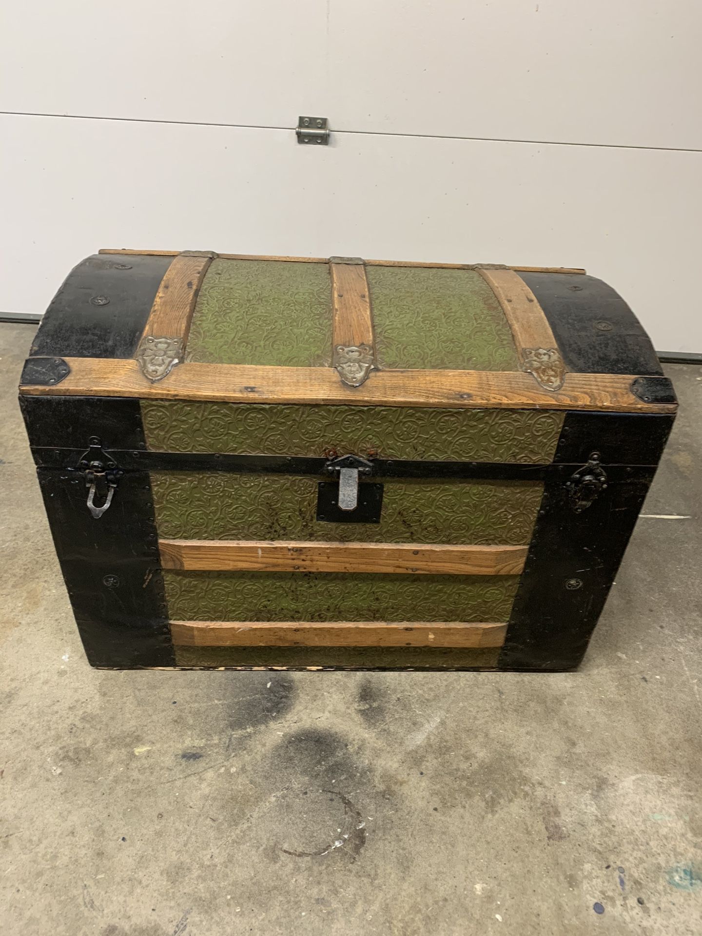 Vintage unrestored metal and wood steamer trunk