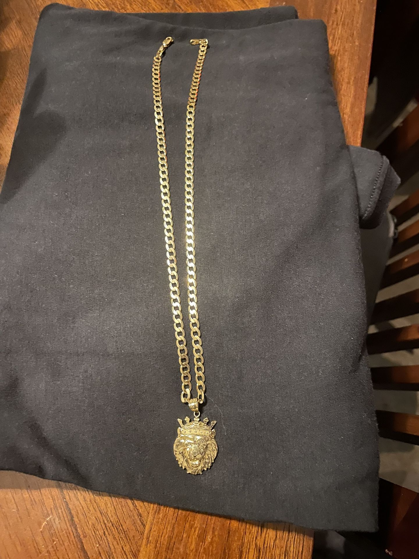OBO OBO 21 Inch Cuban Link 10k Solid Gold Got Some Weight On It With Lion Head Charm Also 10k $700 OBO