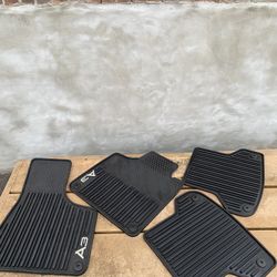 All-Weather Rubber Floor Mat - Set Of Four Extremely durable all weather mats featuring the A3 logo  Including Audi Seatbelt Cover 