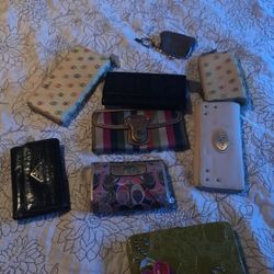 Coach, Dooney & Bourke, Prada wallets