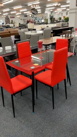New Red table with 4 chairs .