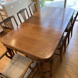 Antique solid hardwood dining table with six chairs