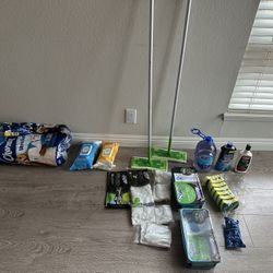 New cleaning supplies, swiffer, wet mopping pads, disinfectant wipes, toilet paper rolls, Brita 6M 