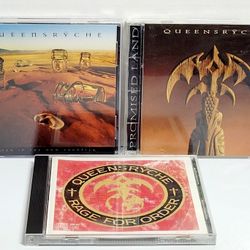 (Lot Of 3) 1986 Queensrÿche Rage for Order/Promised Land/Hear The Now Frontier. Disc Scratches. Queensrÿche is an American progressive metal band form