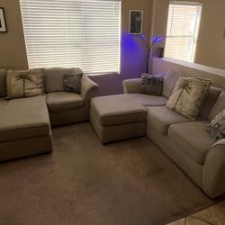 Two light colored olive sofas, each one with the lounger extension that can be moved to any position within the three cushions. Can be sold individual