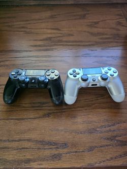 2 Sony PS4 DualShock 4 Controllers – Black and Silver