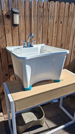 Utility/Laundry sink with faucet and hose connections included