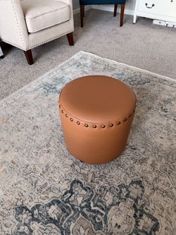 Round Leather Ottoman with Nailhead Trim