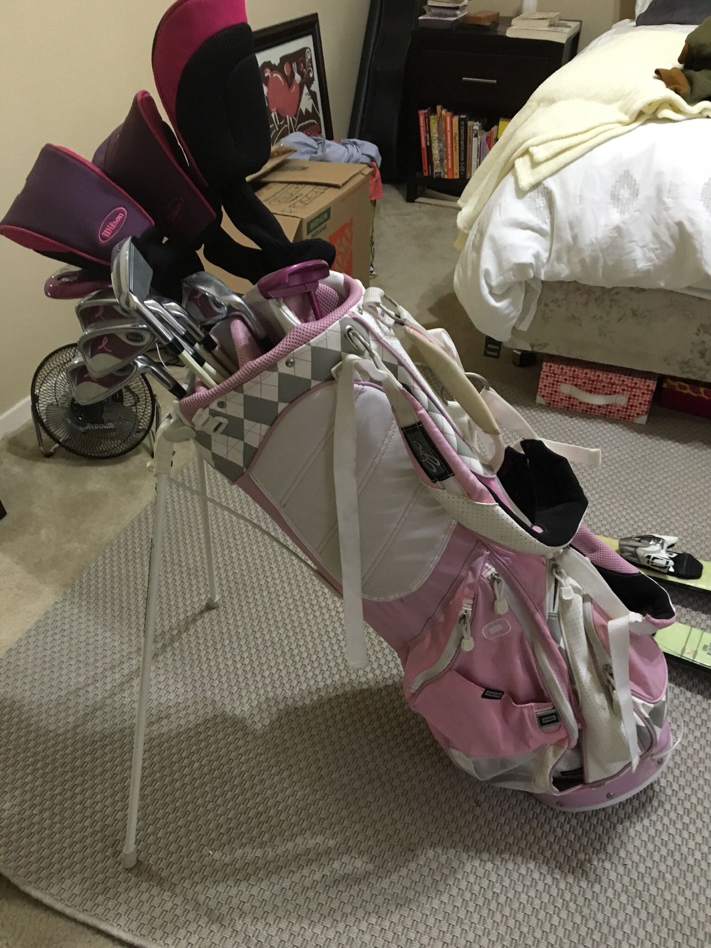Wilson Hope women’s golf clubs and pink argyle Ogio golf bag. Used a handful of times and in great condition!