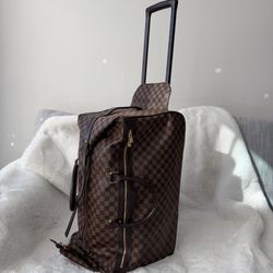 Louis Vuitton Eole 50 rolling luggage bag in the Damier Ebène canvas