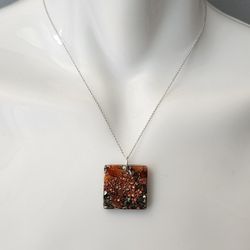 Orgonite Pendant with Pyrite & Carnelian – EMF Protection, Energy Balance, Copper & Resin, 925 Sterling Silver Chain, Handmade Crystal Necklace

Descr