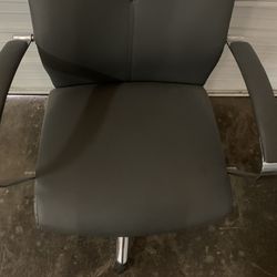 12 Leather fully adjustable high back chairs with rollers  ($40 each) 