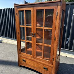 Lighted Mission-style two door Curio Cabinet