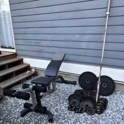 Weights And Bar 305 Lbs Plus Bench 