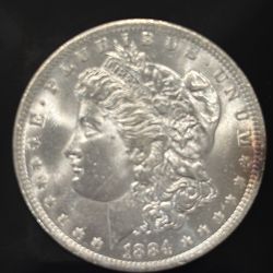 1884-O Morgan Silver Dollar AU Detail