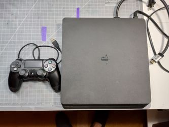 PS4 slim 1 tb - with 12 games