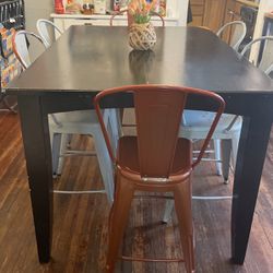 wood  table with metal  chairs 