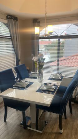 White Table With Blue Chairs