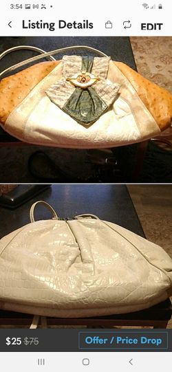 Small Bag Of Multicolored Leathers With Spring Open Inside