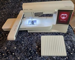 Husqvarna Viking Designer Ruby  with hoops, and rolling case