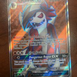 Lycanroc Gx, Vapereon Team Plasma, Blastoise V, And Thunderus EX with sleeves