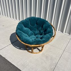 Papasan swivel chair with teal velvet  cushion