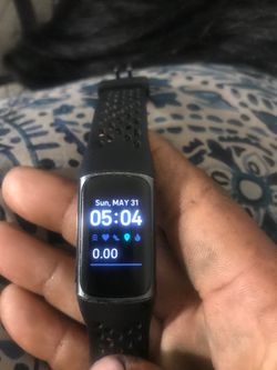 Fitbit luxe watch and charger