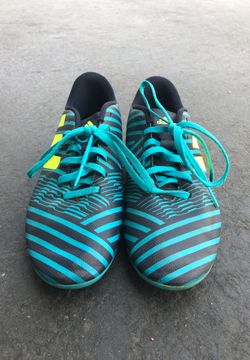 Blue adidas cleats