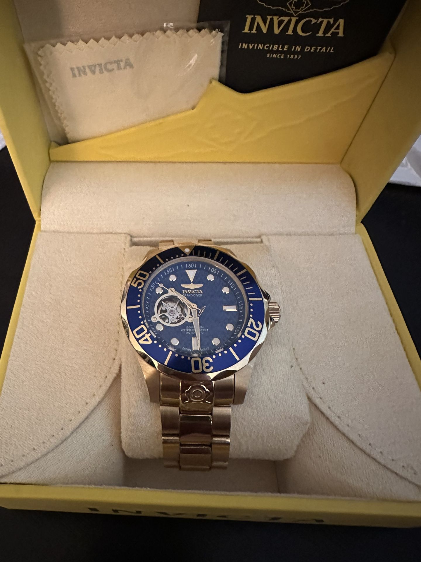 Gold Invicta Blue Face Watch.