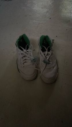 Green in white Jordans