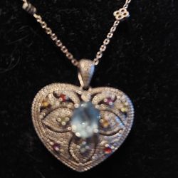 1 CT BLUE TOPAZ AND MULTI GEM HEART LOCKET
