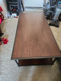 Coffee table wide 48 inches high 18 inches depth 24 inches    $25 or make offer