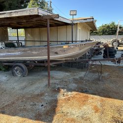 Small aluminum fishing boat w/trailer