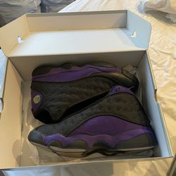 Purple and black jordan 13s size 11.5