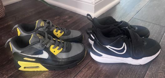 Two Pairs of Kids Nike Sneakers
