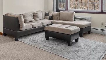 Hazelnut beige L shape couch with ottoman 2 tone pu leather micro fiber 2 pcs set And 5’3 X 7’6 Light Gray Area Rug 